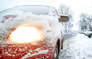 Icy red car | Sioux Falls hail damage repair