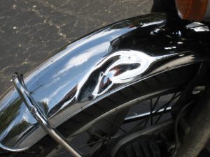 dent in black motorcycle fender | brandon motorcycle fender repair