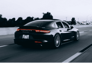 Black Porsche Driving