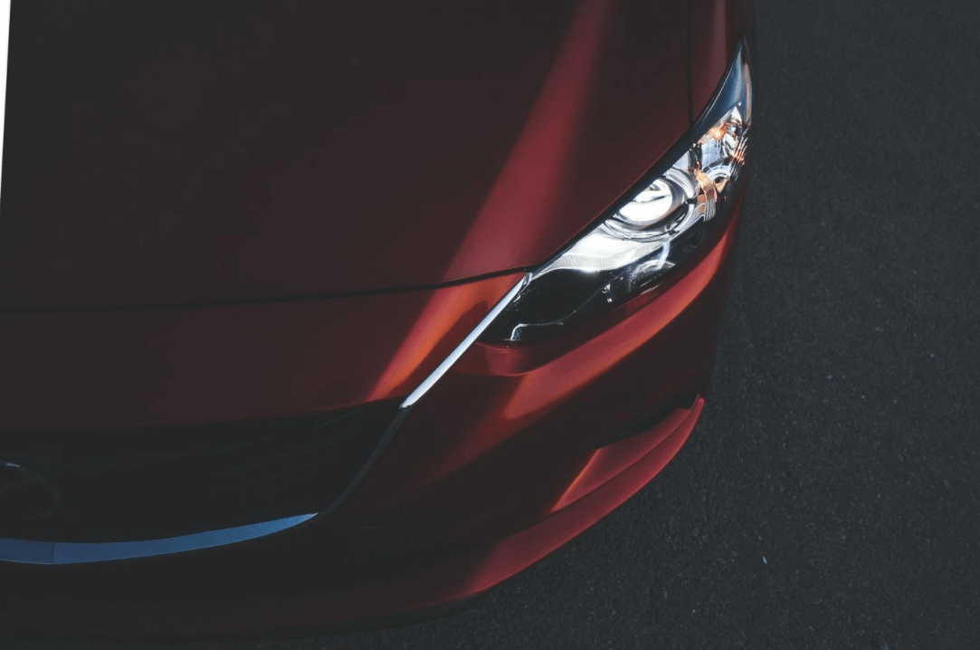 Red Mazda Hood - Paintless Dent Repair